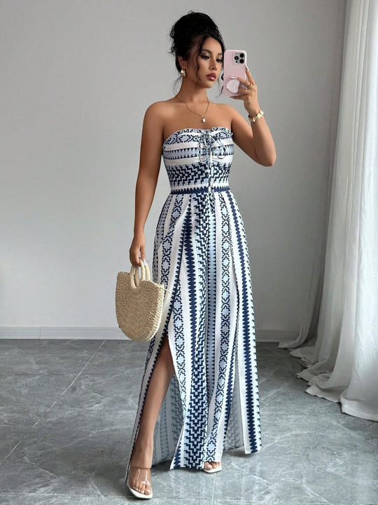 👗 50% OFF NOW! 💥 Geometric Jumpsuit with Halter Neckline & Side Slit – Unique print & elastic back – Versatile, perfect for summer parties or resort wear ✨