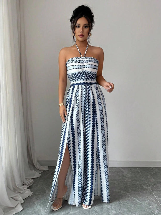 👗 50% OFF NOW! 💥 Geometric Jumpsuit with Halter Neckline & Side Slit – Unique print & elastic back – Versatile, perfect for summer parties or resort wear ✨