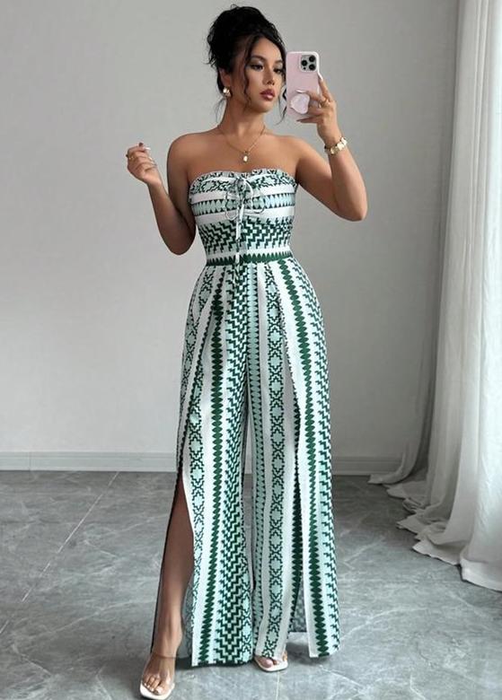 👗 50% OFF NOW! 💥 Geometric Jumpsuit with Halter Neckline & Side Slit – Unique print & elastic back – Versatile, perfect for summer parties or resort wear ✨