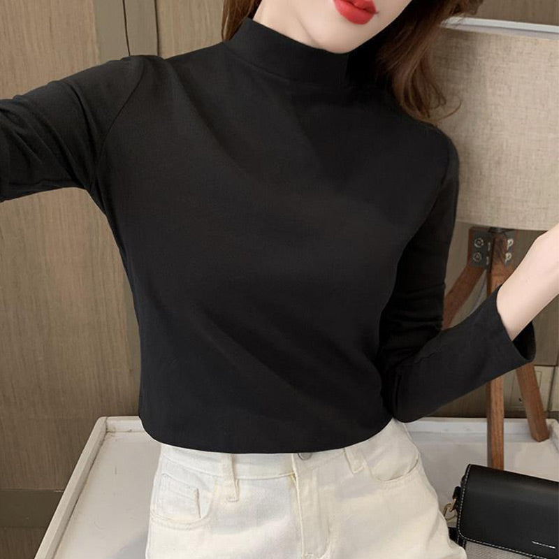 Top cómodo de manga larga con cuello medio alto y color sólido para mujer